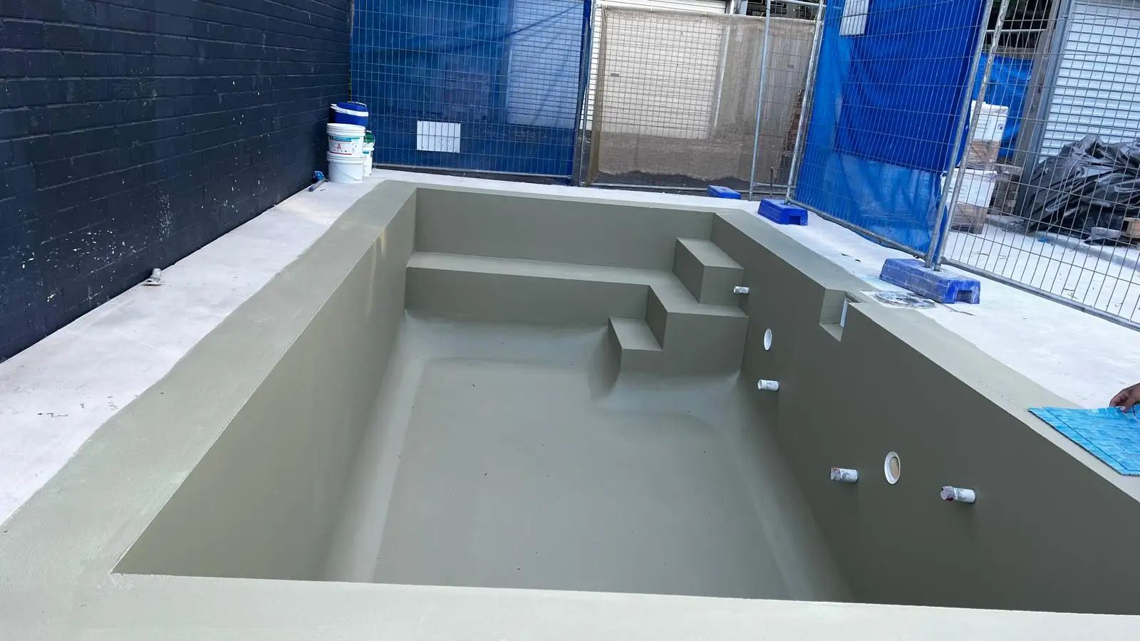 Completed pool area tiling in Brisbane with anti-slip finish